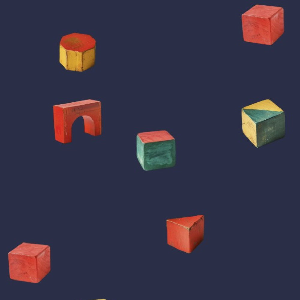 Detail van onesie met blokkenprint van Snurk