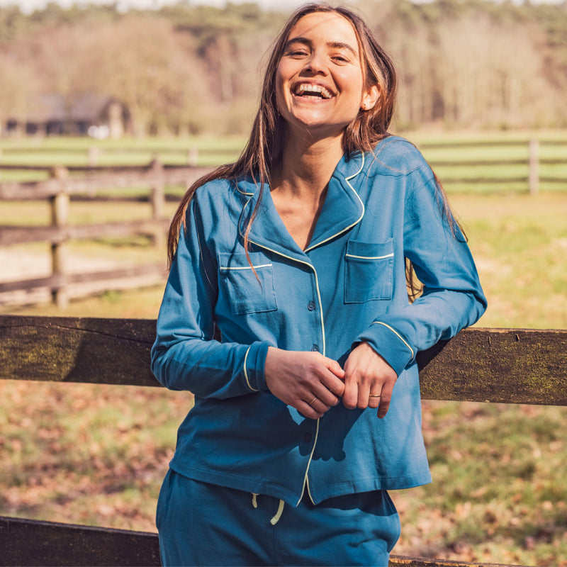 Pyjama groenblauw met licht biesje van Woody